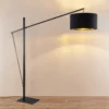 Arcchio kaareva lattiavalaisin Mossa, 200 cm, musta-kulta, tekstiili