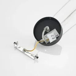 Arcchio LED-riippuvalaisin Vanida, musta, Ø 60 cm, ylös/alas -valaisin