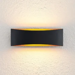 Arcchio LED-seinävalaisin Jelle, 27 cm, musta/kulta, ylös/alasvalo