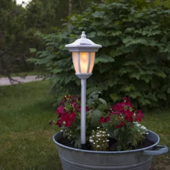 Aurinkokäyttöinen Flame-LED-lamppu 4In1 valkoinen