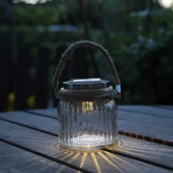 Aurinkokäyttöinen lasinen LED-pöytävalaisin Jar