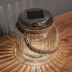 Aurinkokäyttöinen lasinen LED-pöytävalaisin Jar