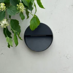 Dyberg Larsen LED-ulkoseinälamppu Pluto, musta, Ø 15 cm