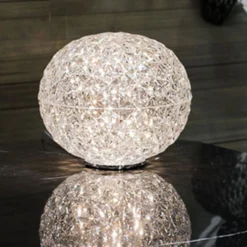 Kartell Planet -LED-pöytälamppu pyöreä, läpinäkyvä
