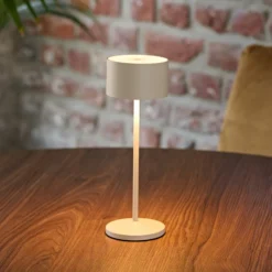 LED-akku-pöytälamppu Veluna, beige, korkeus 25 cm, IP44, himmennettävä CCT