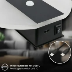 LED-akku-seinävalaisin Taro, musta matta, Ø 15 cm, anturi