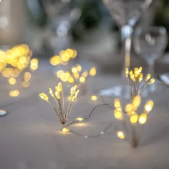 LED-keijuvalot Dew Drop Flower, hopea, 140 cm, paristo, paristo