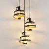 Lindby Colten-riippuvalaisin, Ø 50 cm, 3-valo, musta, kultaa