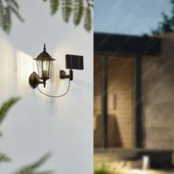 Lindby LED-aurinkoseinävalaisin Sayata, musta, alumiini, lyhty
