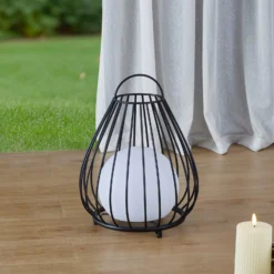 Lindby LED-aurinkovalaisin Kelda, musta, metalli, 38cm, himmeä.