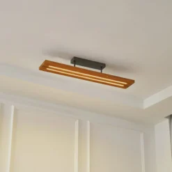 Lindby LED-kattovalaisin Nesaja, musta, puu, 98cm, himmennettävä