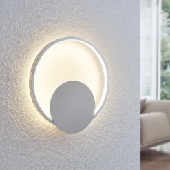Lindby LED-seinävalaisin Anays, Ø 32 cm, kromi/kirkas, muovia