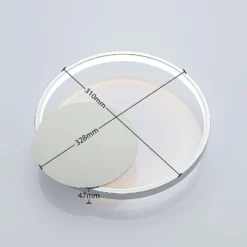 Lindby LED-seinävalaisin Anays, Ø 32 cm, kromi/kirkas, muovia