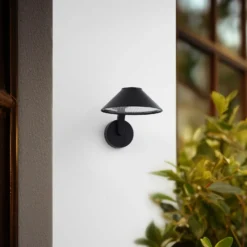 Lindby LED-seinävalaisin Capelo, musta, metalli, Ø20cm