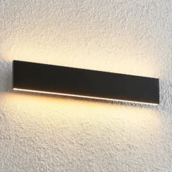 Lindby LED-seinävalaisin Ignazia, 47cm, musta, metalli, ylös/alasvalo