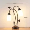 Lindby pöytävalaisin Stefania, musta/kulta, lasi, E14, 40 cm, 40 cm
