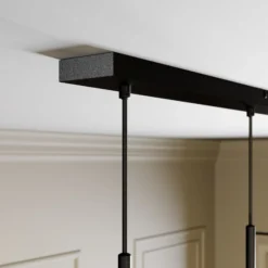 Lucande Carlea -riippuvalo, 8-lamp. musta-messinki