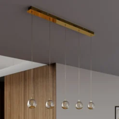 Lucande LED-riippuvalaisin Hayley, 96 cm, 5-valo, kulta, lasi