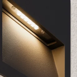Lucande LED-seinäuppovalaisin Loya, 11,5x11,5 cm, harmaa, IP54