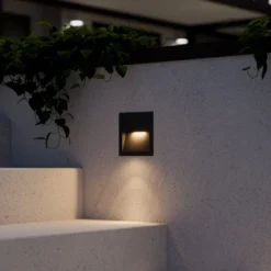 Lucande LED-seinäuppovalaisin Loya, 11,5x11,5 cm, harmaa, IP54