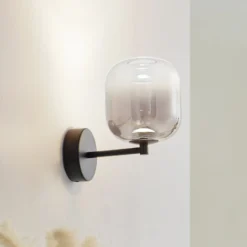 Lucande LED-seinävalaisin Avelina, savunharmaa