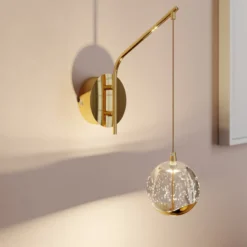 Lucande LED-seinävalaisin Hayley, kullanvärinen, lasia, 34 cm korkea