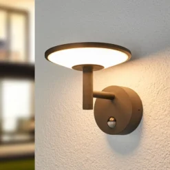 Lucande LED-ulkoseinävalaisin Fenia, anturi, IP54, antrasiittipunainen