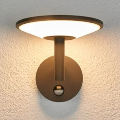 Lucande LED-ulkoseinävalaisin Fenia, anturi, IP54, antrasiittipunainen