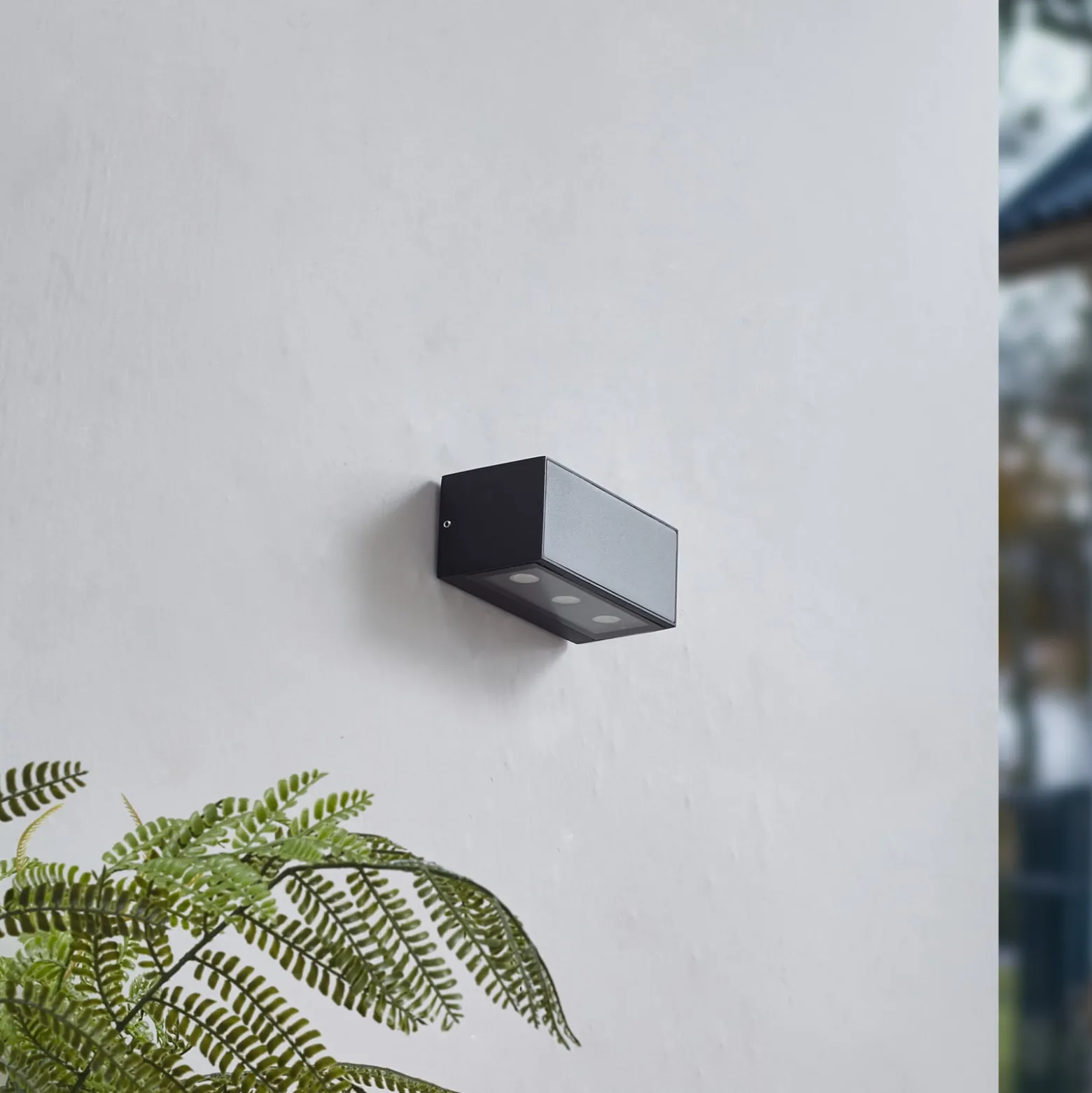 Lucande LED-ulkoseinävalaisin Selim, pituus 15,3 cm, musta
