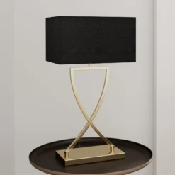 Lucande-pöytävalaisin Evaine, messinki/musta, 66 cm, E27