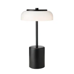 Nuura LED-akkukäyttöinen pöytälamppu Blossi, korkeus 26 cm, musta/opaalinen