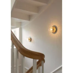 Nuura seinävalaisin Liila 1, IP44, Ø 14 cm, kulta/kirkas