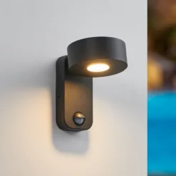 Palosco-LED-ulkoseinälamppu, musta, korkeus 17 cm, metallia, liiketunnistin