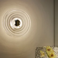 Tom Dixon LED-seinävalaisin Press Mini, läpinäkyvä, 21 cm, IP55