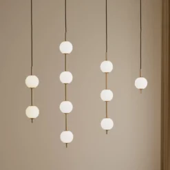 UMAGE LED-riippuvalaisin Audrey, messinkivärinen, 2-lamppuinen, Ø 12 cm