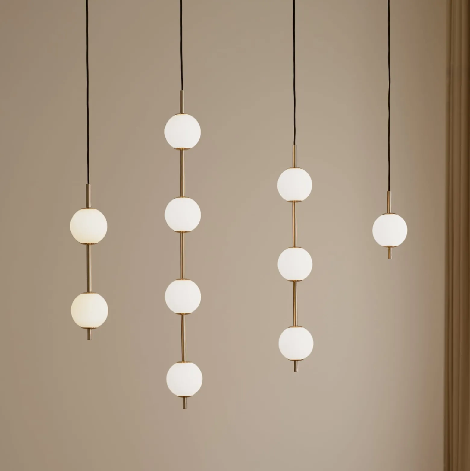 UMAGE LED-riippuvalaisin Audrey, messinkivärinen, 2-lamppuinen, Ø 12 cm